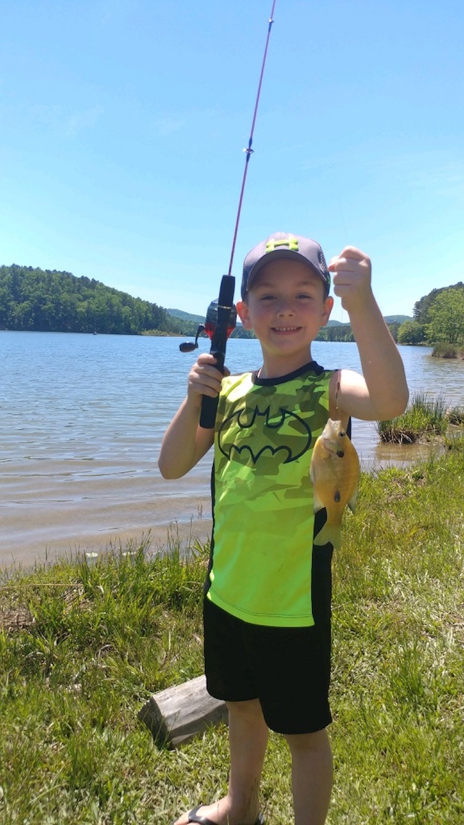 Boy Holding Bluegill Sunfish