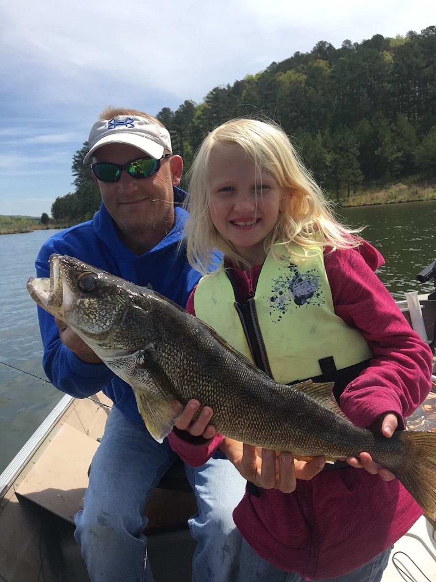 Girl and Dad Holding Walleye
