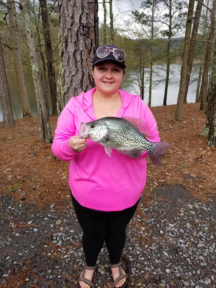 Woman Holding Black Crappie